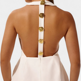 Yvonne - Minidress s halterovým výstřihem, odhalenými zády a květinovým detailem